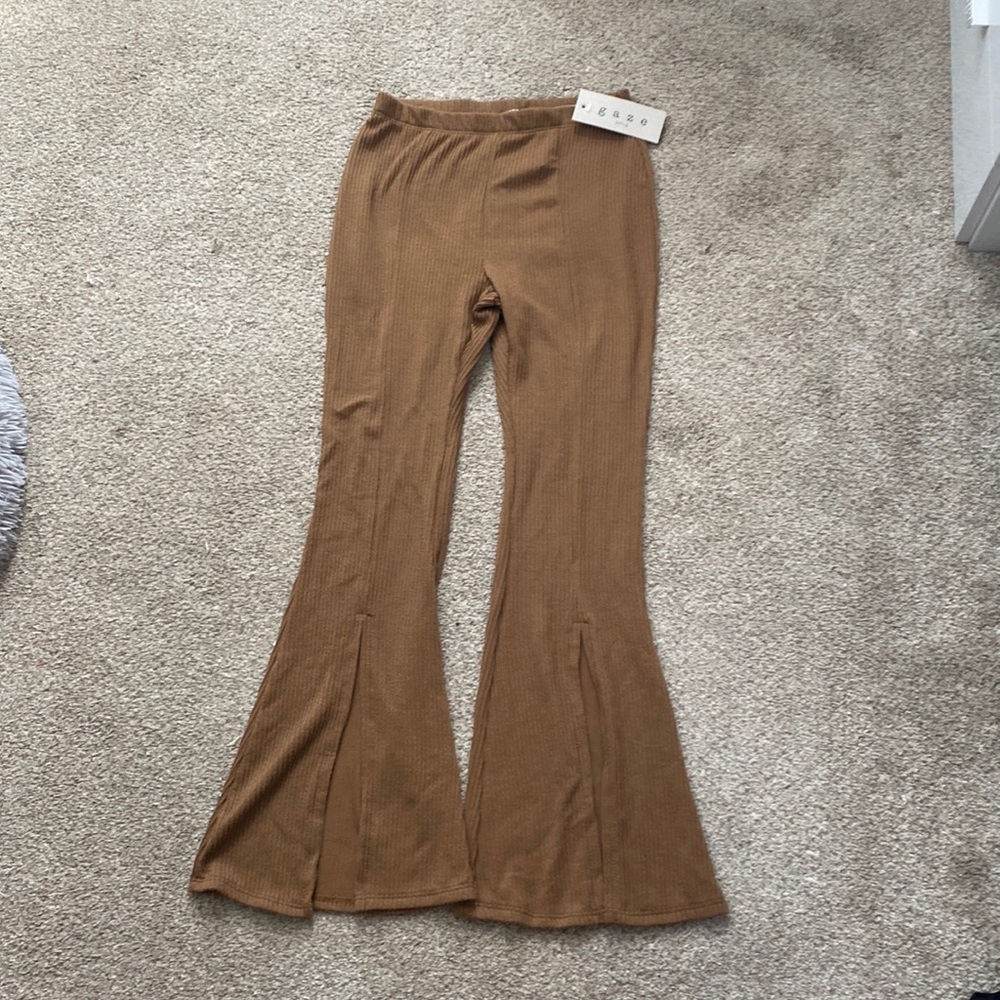 Gaze caramel colored flared knit pants with slits in front.